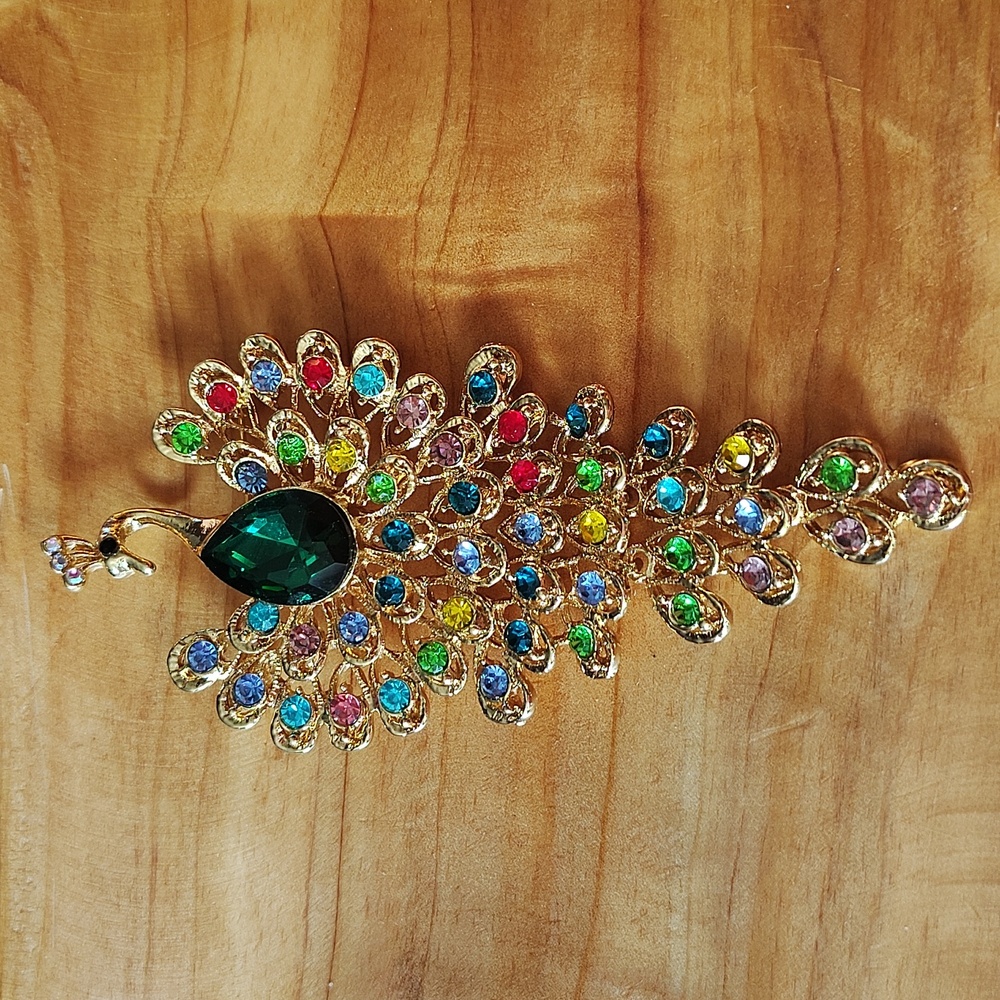 Peacock brooch